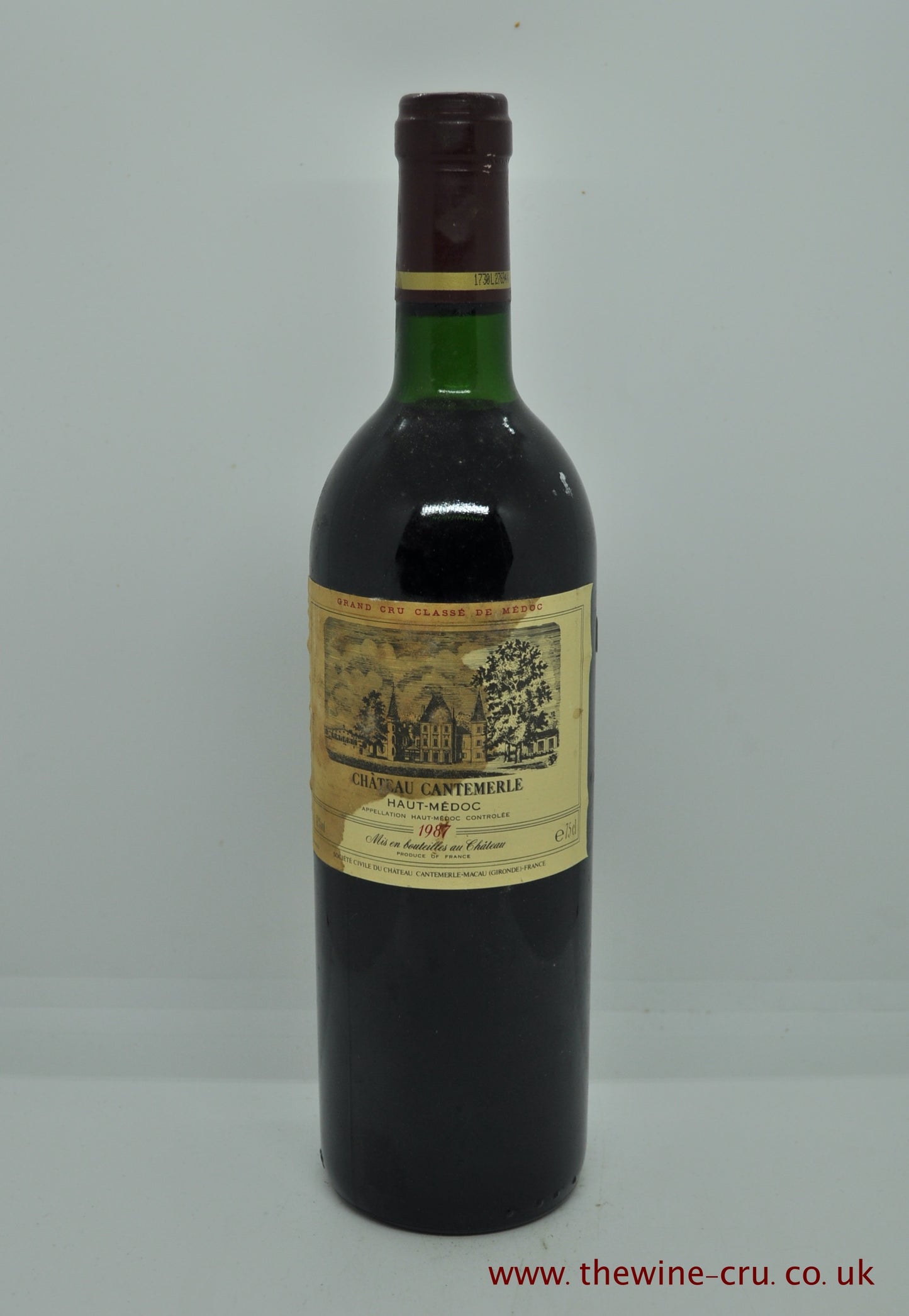 1987 vintage red wine. The bottle is in good condition. Wine level is top shoulder. The labels are stained and a little bin soiled, but compete. Immediate delivery. Free local delivery. Gift wapping available.
