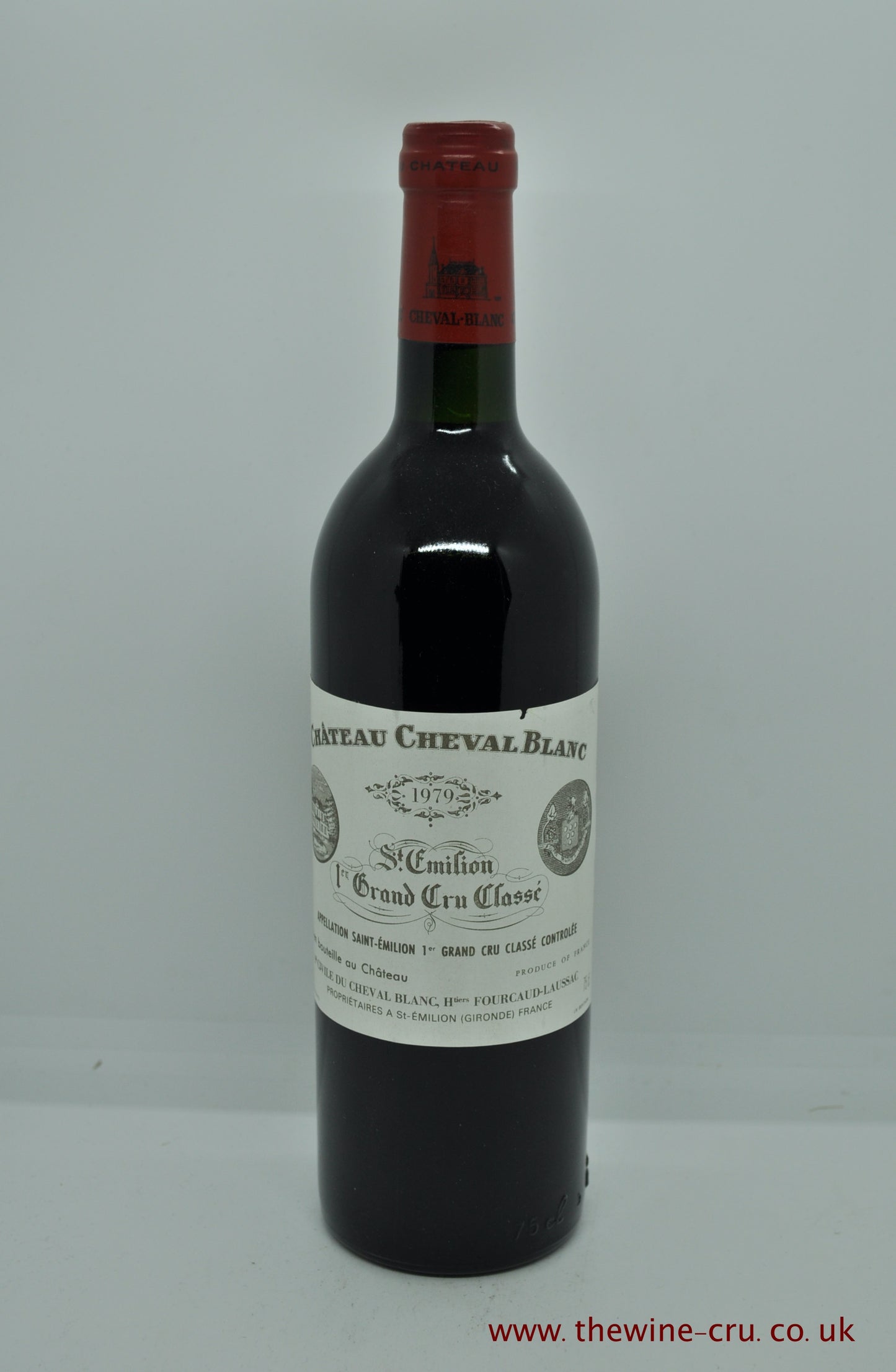 1979 vintage red wine. Chateau Cheval Blanc 1979, France, Bordeaux. The bottle is in good condition with the wine level being base of neck. Immediate delivery. Free local delivery. Gift wrapping available.
