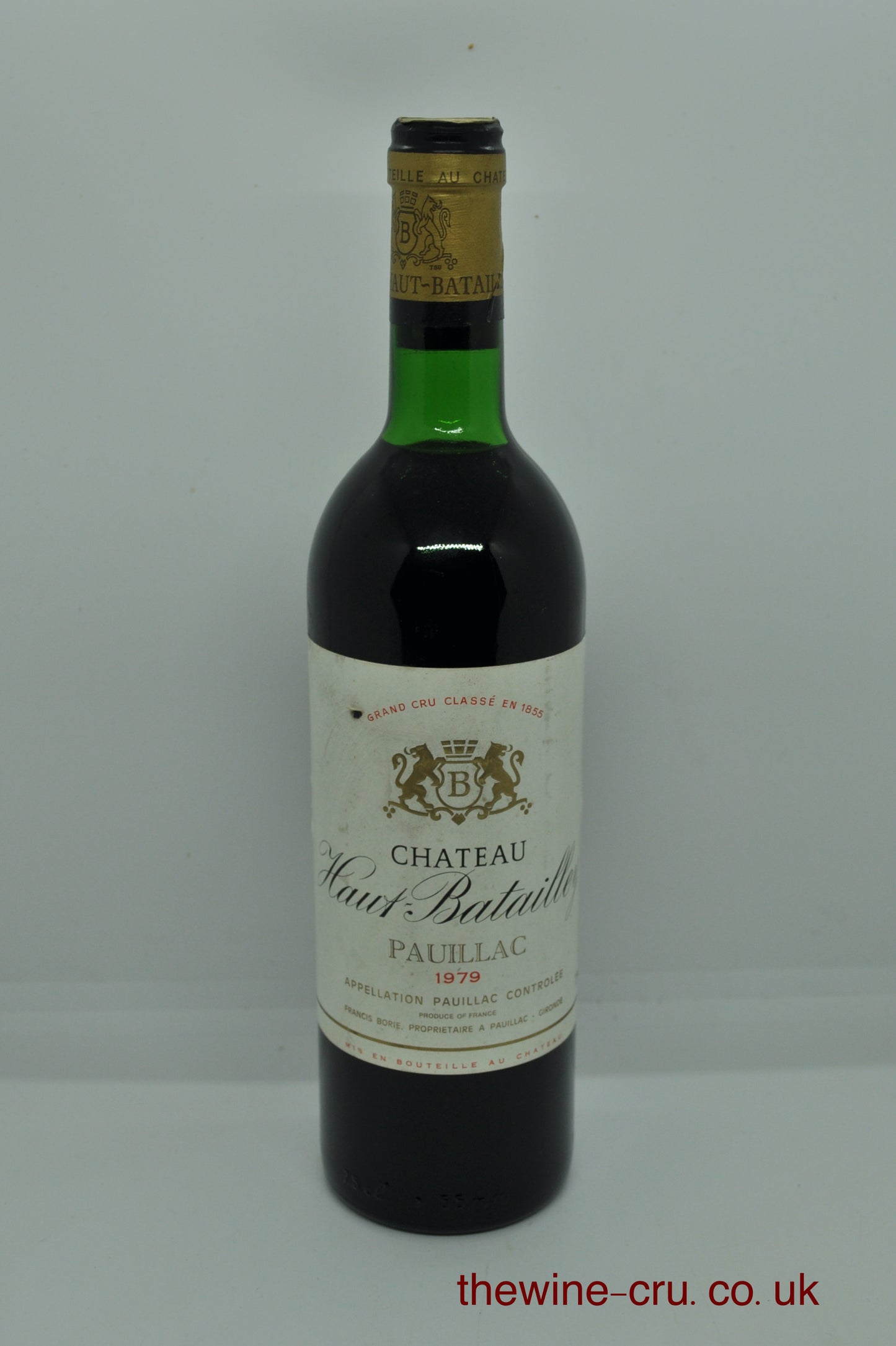 1979 vintage red wine from Pauillac. The bottle is in good condition with the wine level at top shoulder. Immediate delivery. Free local delivery. Gift wrapping available.