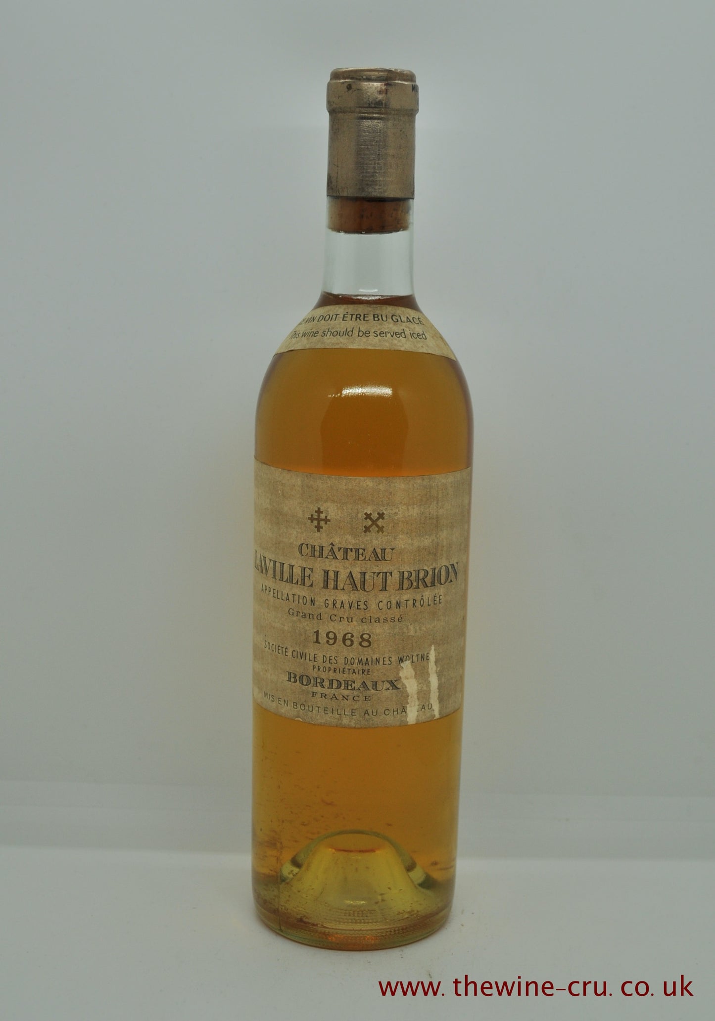 1968 vintage white wine. Chateau Laville Haut Brion Blanc, France, Bordeaux. the bottle is in good condition for its age. Immediate delivery. Free local delivery. Gift wrapping available.