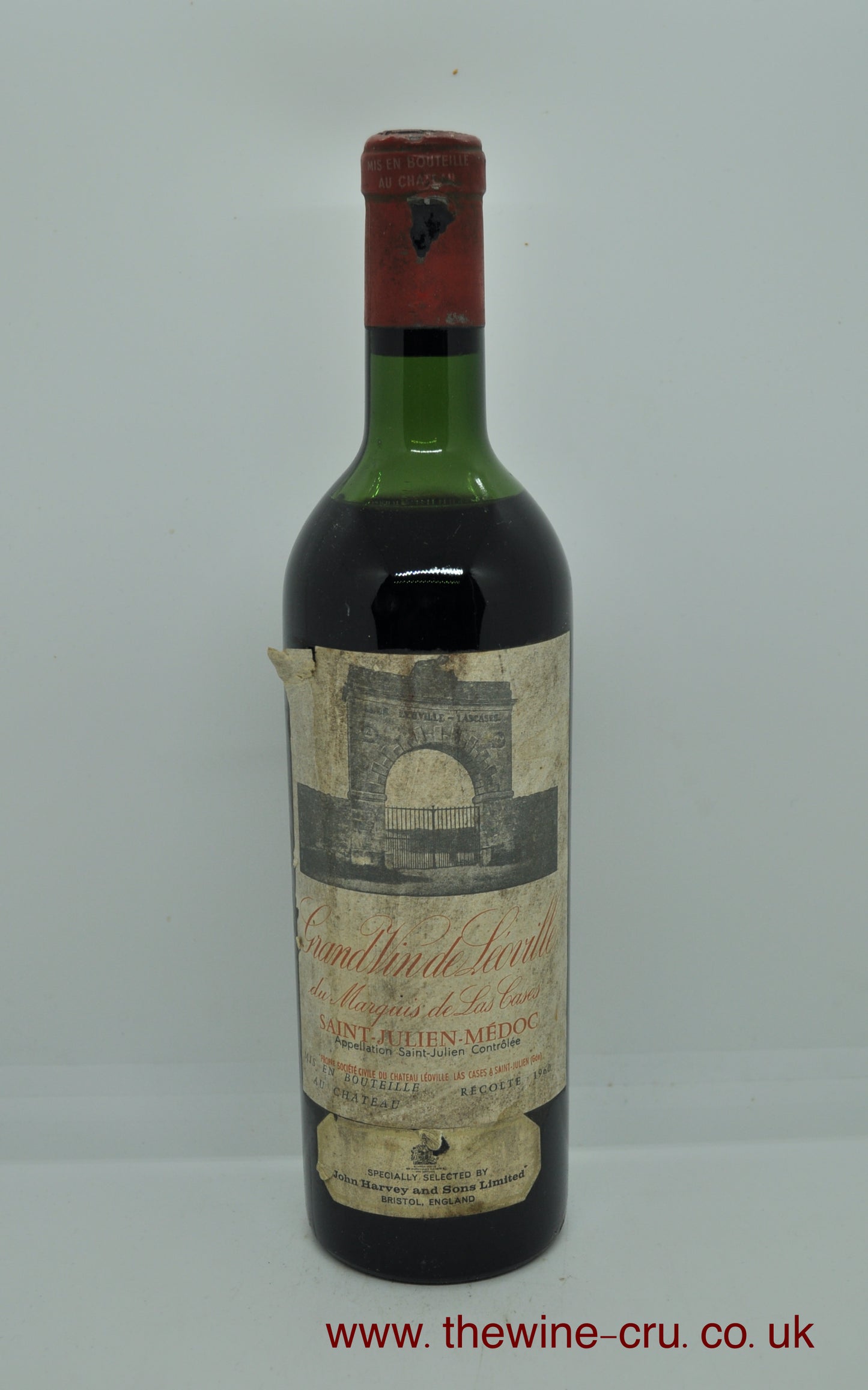 1960 vintage red wine. The bottle has a little capsule damage, label is bin soiled and the wine level is high shoulder. Immediate delivery. Free local delivery. Gift wrapping available.