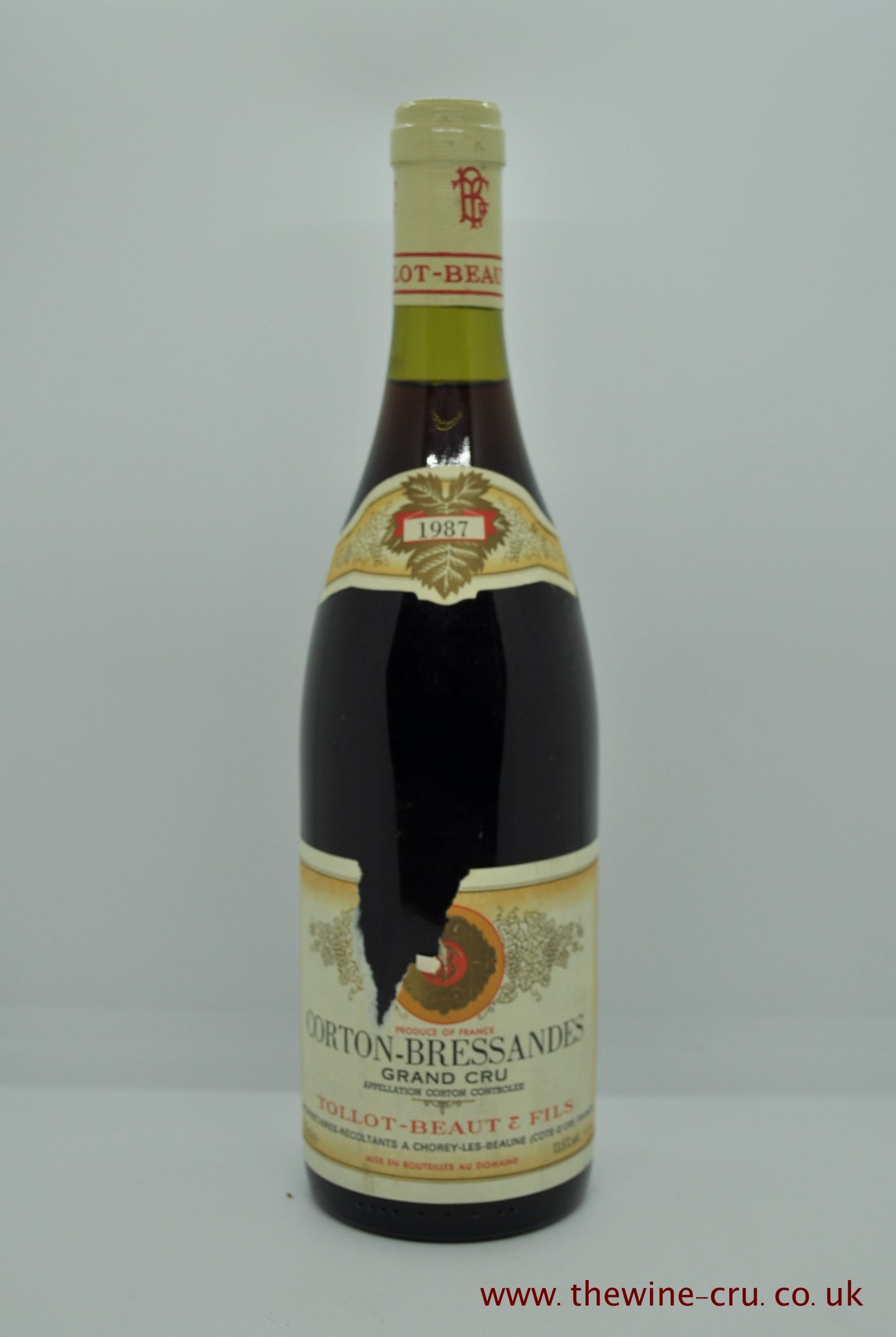 1987 vintage red wine. Corton Bressandes Grand Cru Tolbot Beaut, France, Burgundy. The bottle is in good condition  piece of the label is missing. Immediate delivery. Free local delivery. Gift wrapping available.