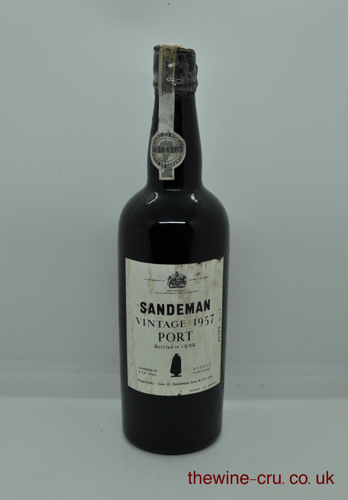 1957 vintage red port wine. The bottle is in good general condition. The wax capsule is chipped and fragile. The wine level is top shoulder. Immediate delivery. Free local delivery. Gift wrapping available.