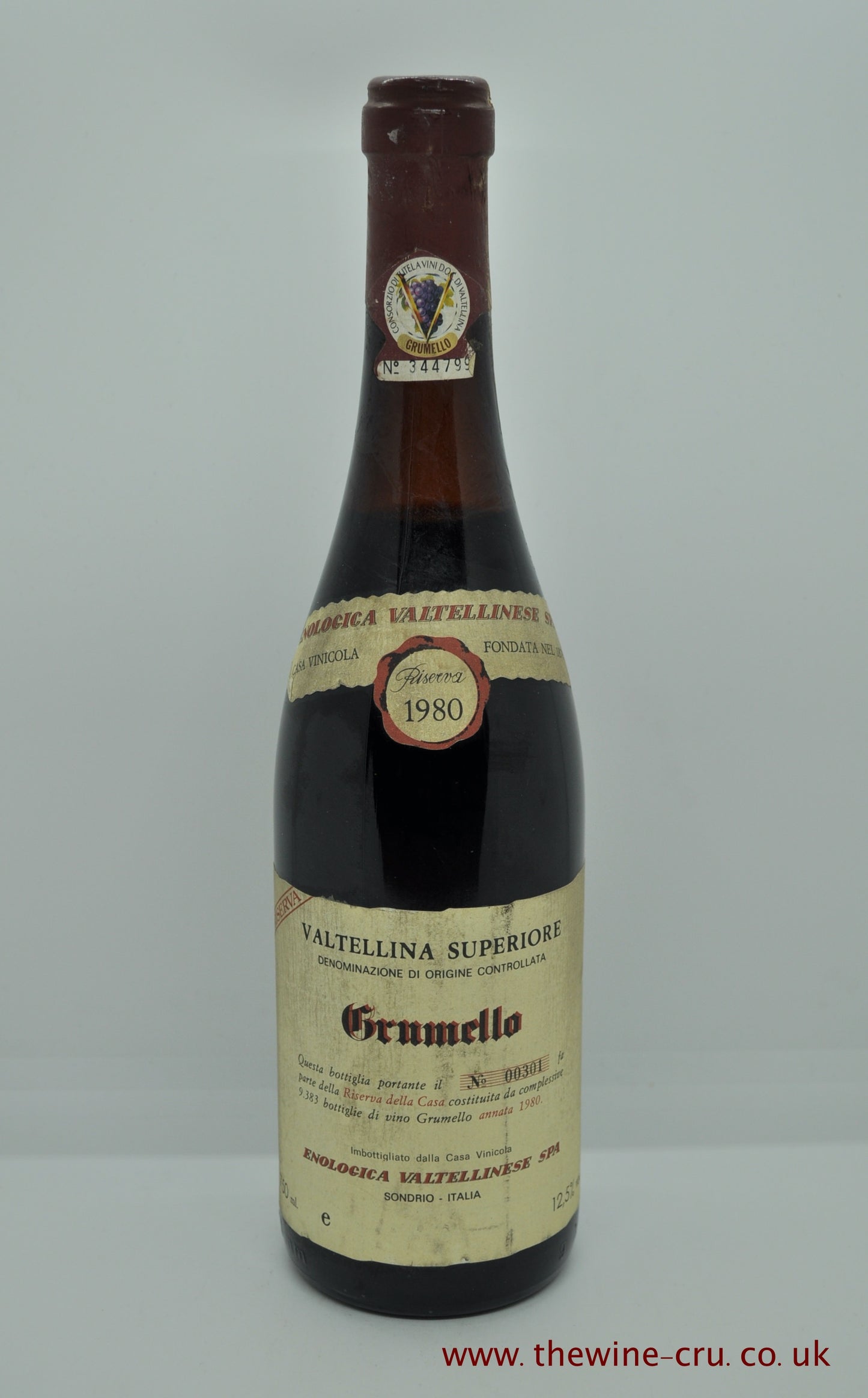1980 vintage red wine. Enoloica Valtellinese Grumelo 1980. Italy Lombardy. The bottle is in good general condition with the wine level being 3cm blow base of cork. Immediate delivery. Free local delivery.  Gift wrapping available