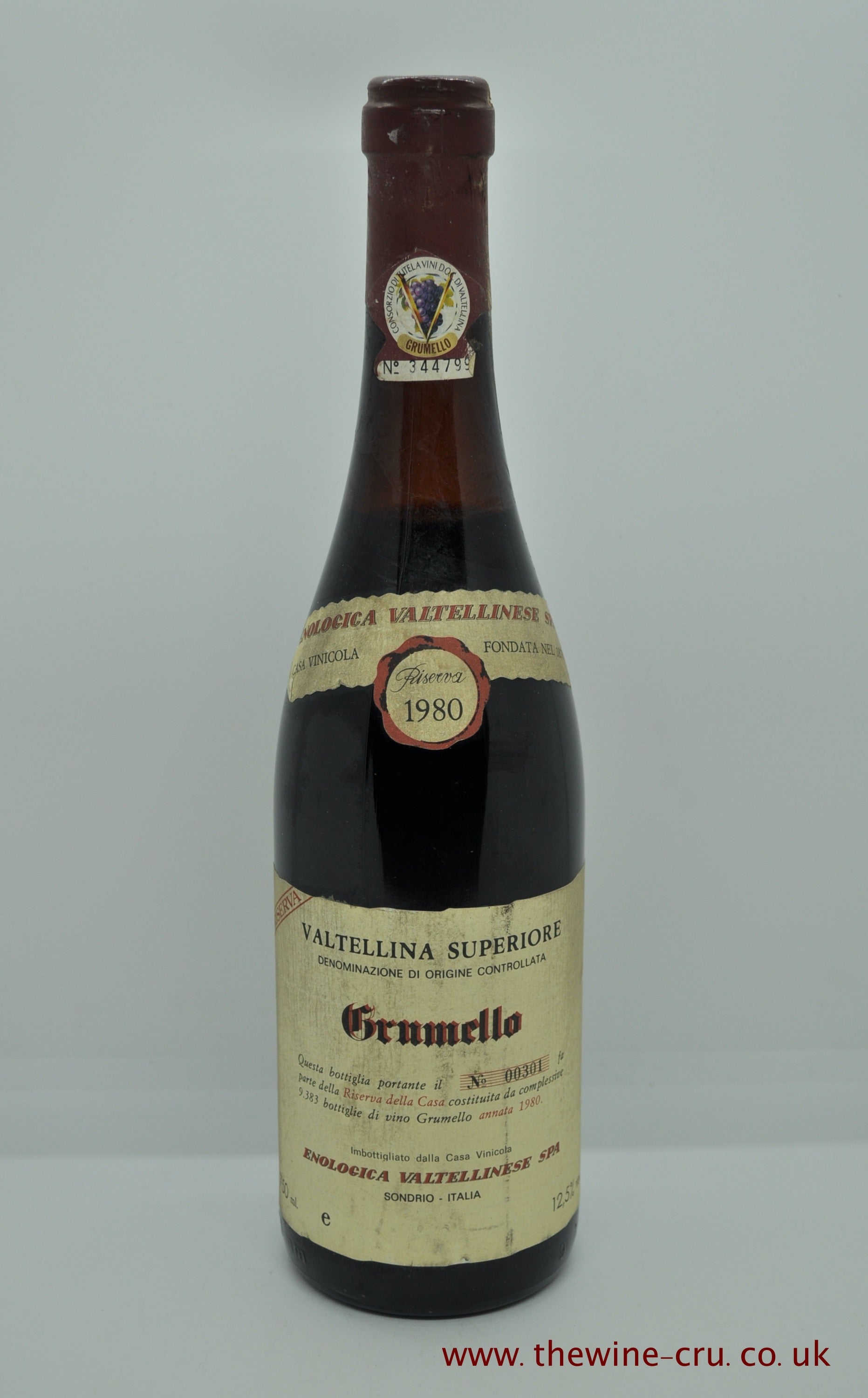 1980 vintage red wine. Enoloica Valtellinese Grumelo 1980. Italy Lombardy. The bottle is in good general condition with the wine level being 3cm blow base of cork. Immediate delivery. Free local delivery.  Gift wrapping available