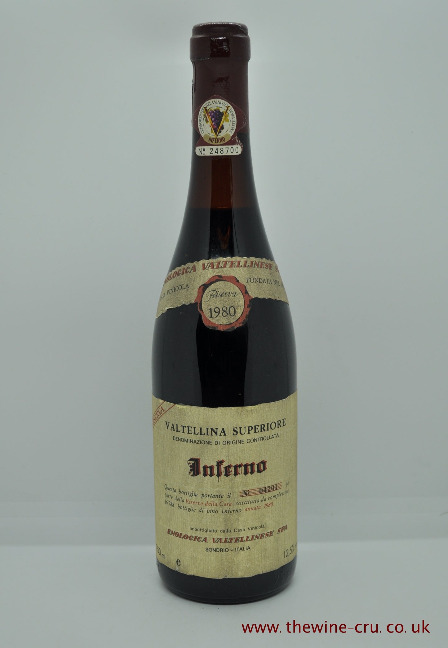 1980 vintage red wine.Enologica Vltellinese Inferno 1980. Italy Lombardy. The bottle is in good general condition with the wine level is 3cm below base of the cork. Immediate delivery. Free local delivery. Gift wrapping available.
