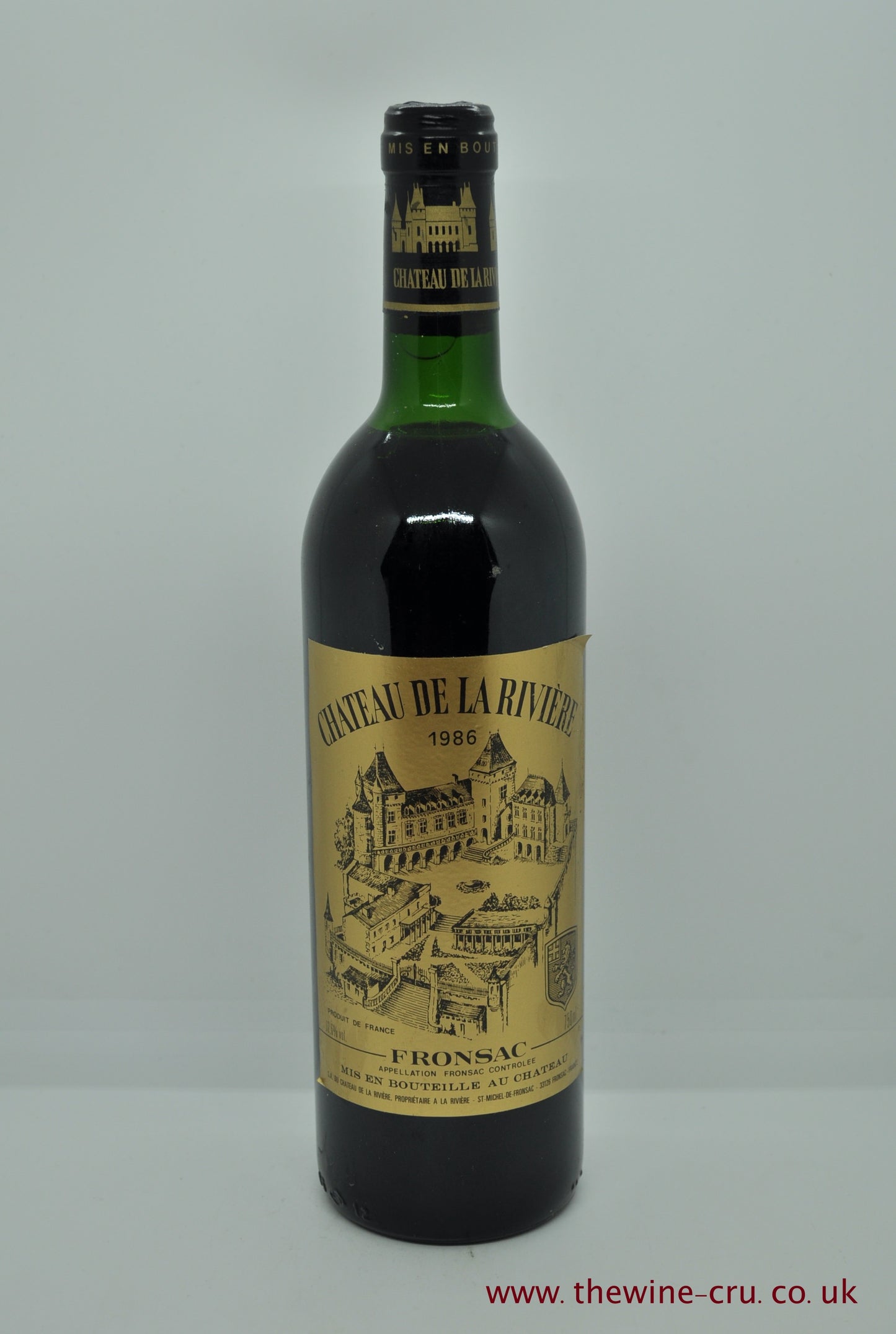 1986 vintage red wine. Chateau De La Riviere. France, Bordeaux. The level oe the wine is top shoulder. Immediate delivery. Free local delivery. Gift wrapping available.