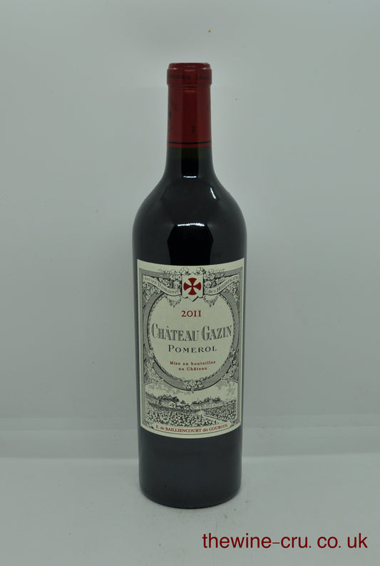 Bottle of Chateau Gazin Pomerol wine on a white background. 2011 vintage red wine. The bottle is in good condition. Immediate delivery. Free local delivery. Gift wrapping available.