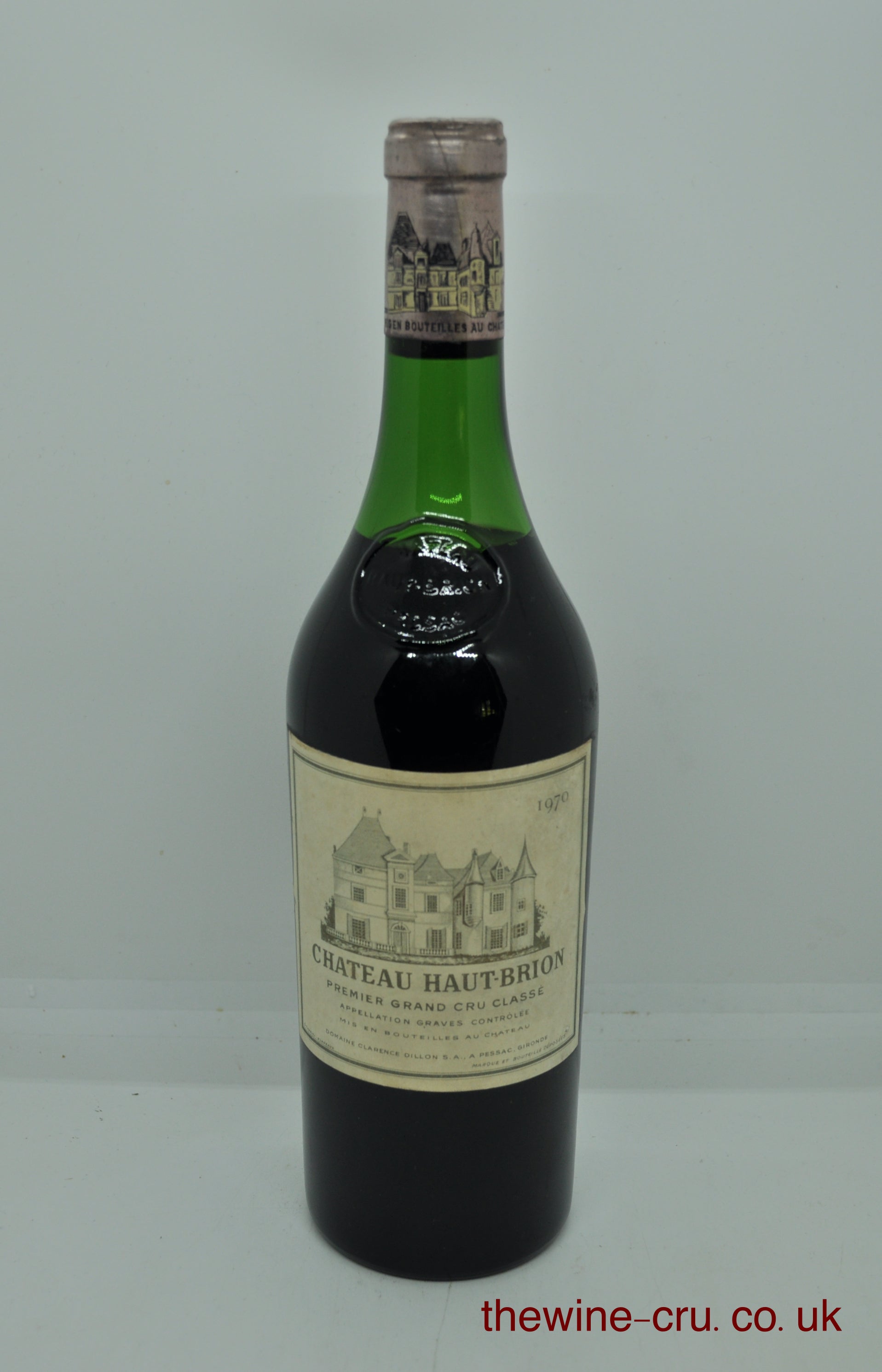 1970 vintage red wine. The bottle is in good condition. The wine level is abut 5cm from the base of the cork. Good for Haut Brion of this age. Immediate delivery. Free local delivery. Gift wrapping available.