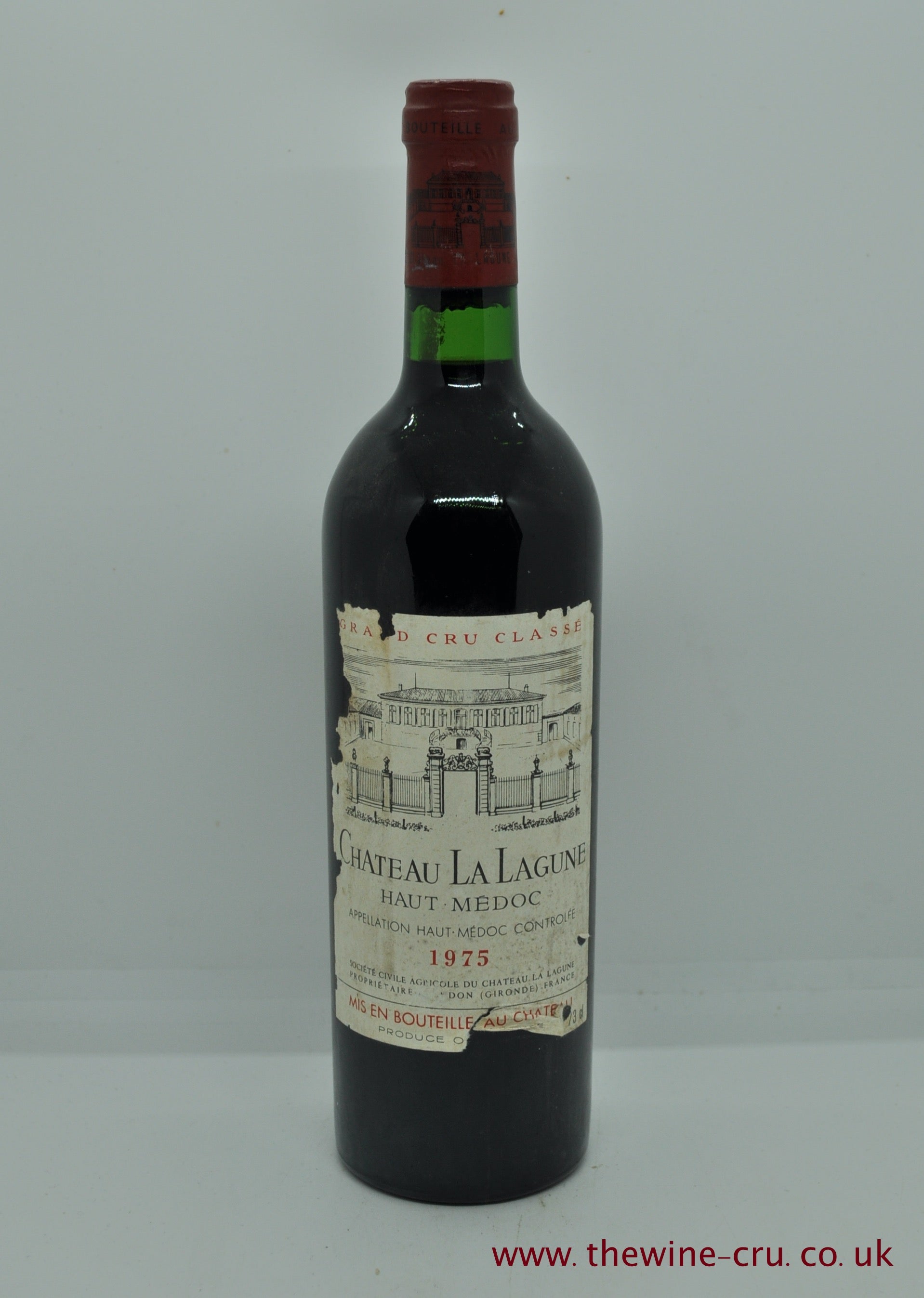 1975 vintage red wine. The bottle is in general good condition, the labels are bin soiled and a bit scrappy. Immediate delivery. Free local delivery. Gift wrapping available.