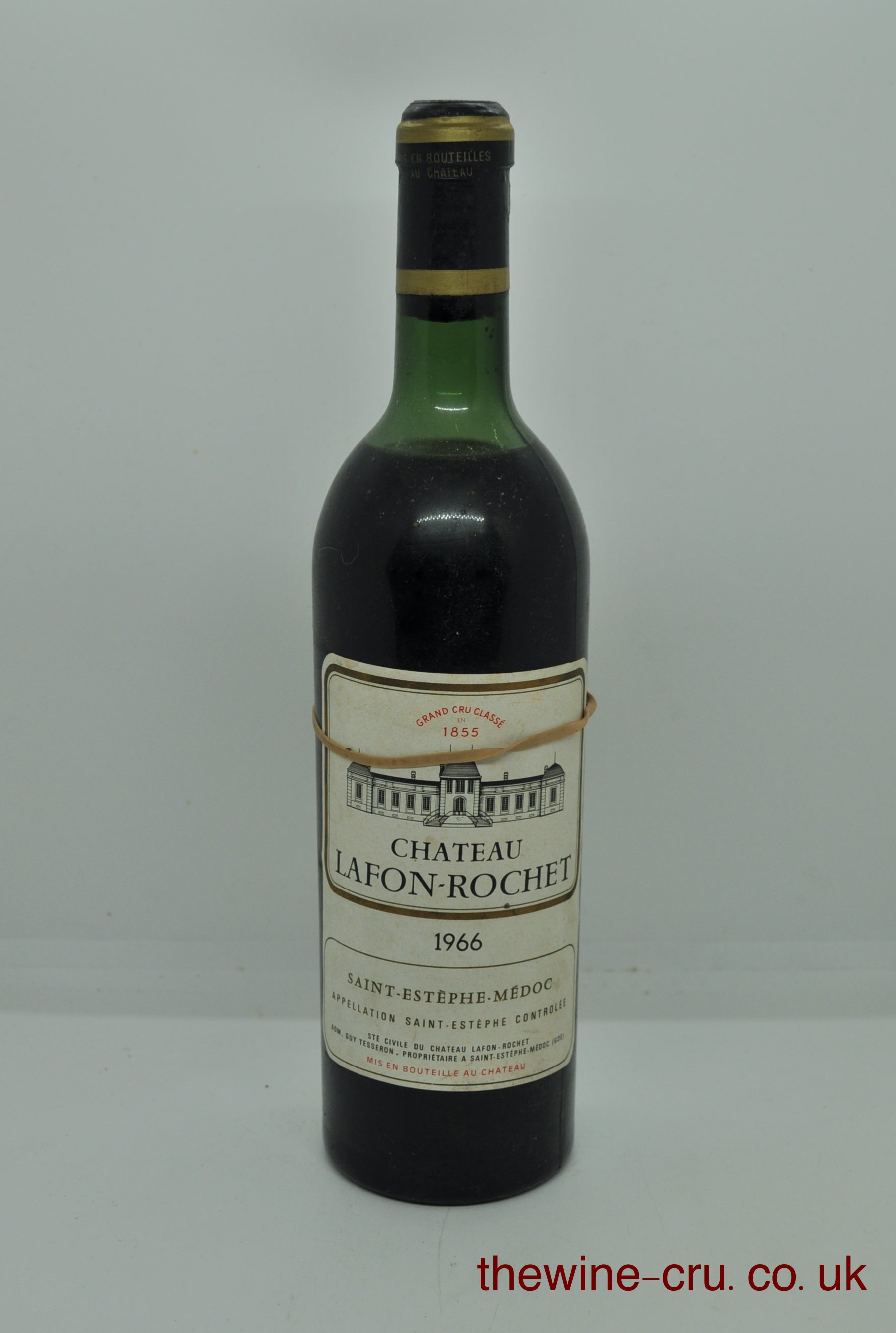1966 vintage red wine. The bootle is in good condition. The wine level is top shoulder. The label is complete, but loose and held on with an elastic band. Immediate delivery. Free local delivery. Gift wrapping available.