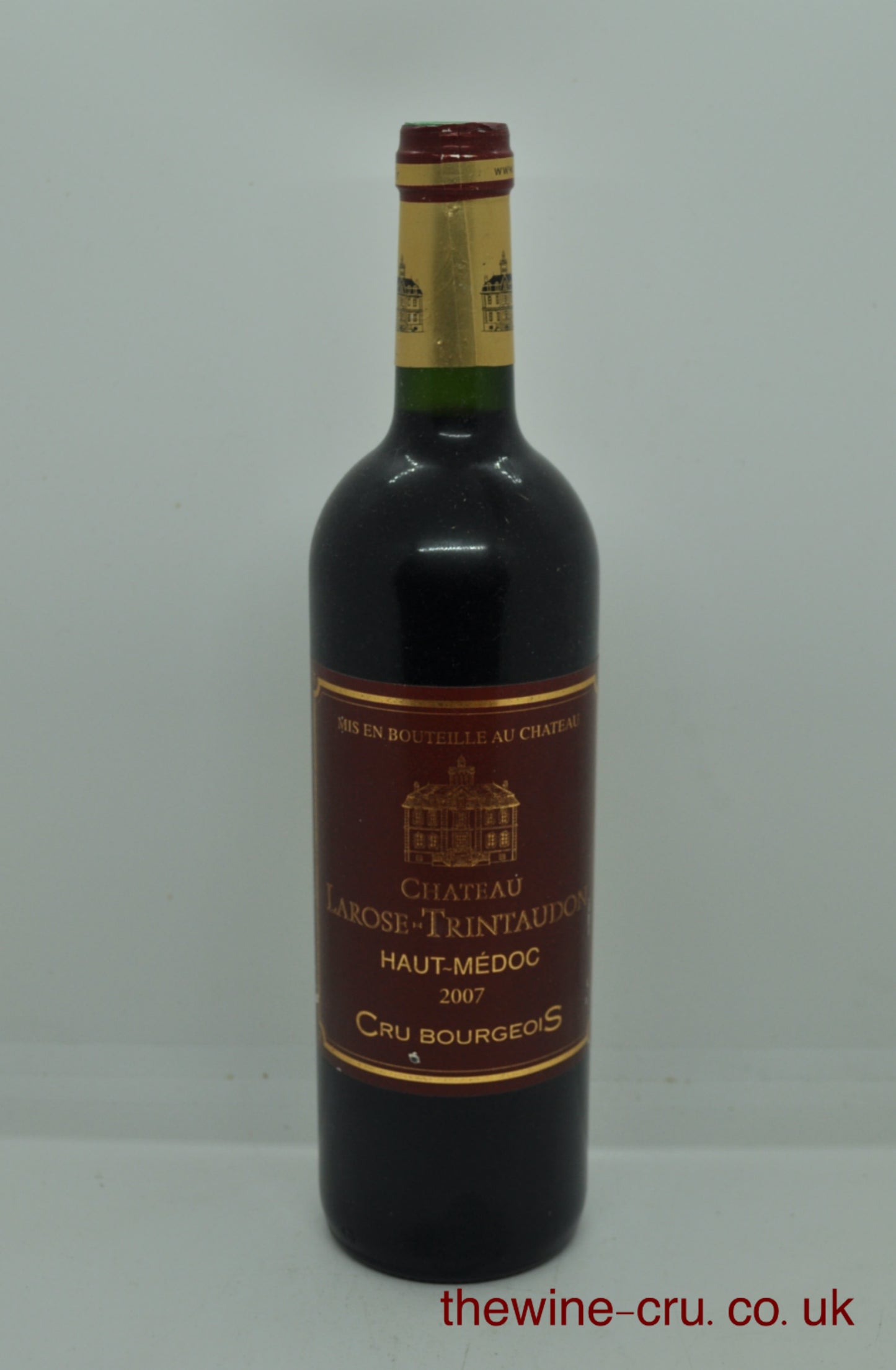 A bottle of Château La Rose-Trintauville Haut-Médoc Cru Bourgeois vintage 2007 red wine. The bottle is in good condition. Immediate delivery. Free local delivery. Gift wrapping available.