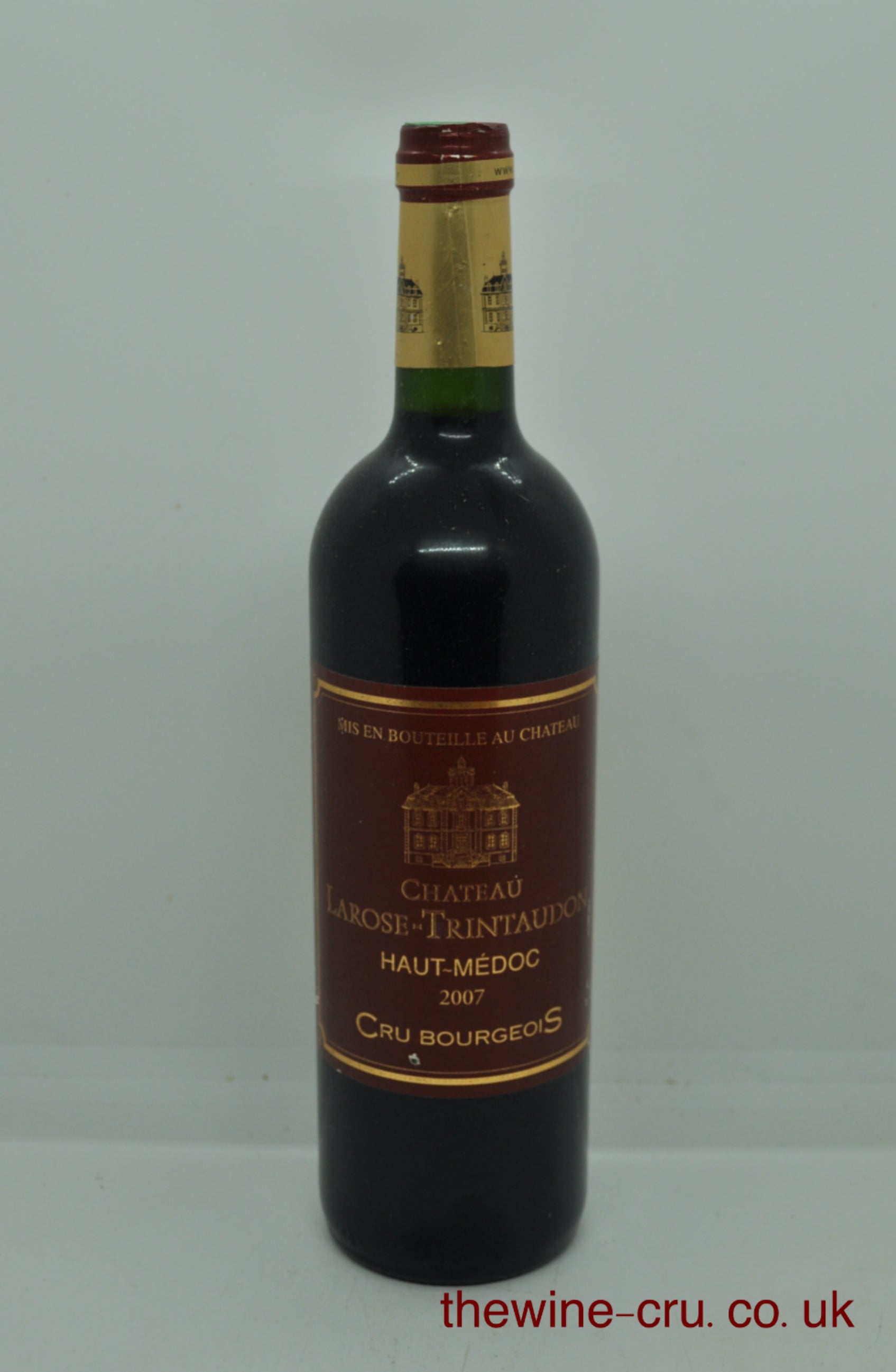 A bottle of Château La Rose-Trintauville Haut-Médoc Cru Bourgeois vintage 2007 red wine. The bottle is in good condition. Immediate delivery. Free local delivery. Gift wrapping available.