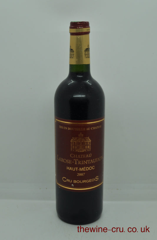 A bottle of Château La Rose-Trintauville Haut-Médoc Cru Bourgeois vintage 2007 red wine. The bottle is in good condition. Immediate delivery. Free local delivery. Gift wrapping available.