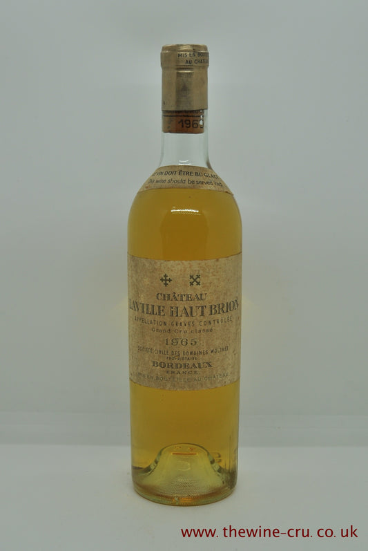 1965 dry white wine. Chateau Laville Haut Brion Blanc, france, Bordeaux. The bottle is in good condition and the wine level is top shoulder. Immediate delivery. Free local delivery. gift wrapping available.