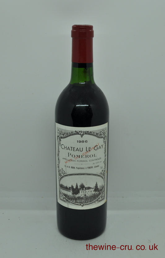 1986 vintage red wine from Pomerol. The bottle is in good condition with the wine level ver top shoulder. Immediate delivery. Free local delivery. Gift wrapping available.