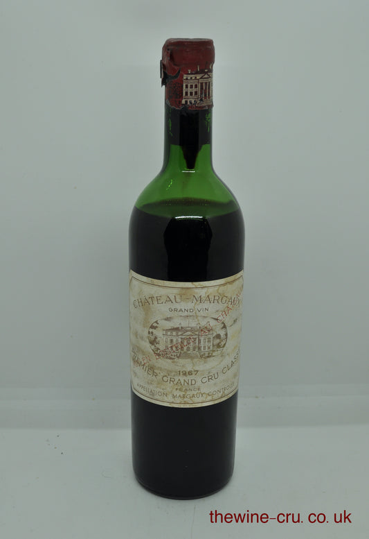1967 vintage red wine. The capsule has some damage, but the top is sound. Label bin soiled and the wine level is low shoulder. Immediate delivery. Free local delivery. Gift wrapping available.