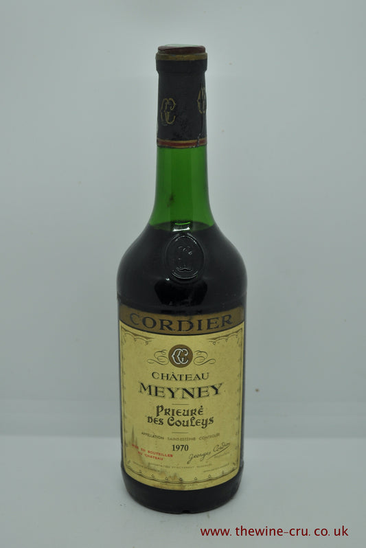 1970 vintage red wine from Bordeaux, France. The bottle is in good general condition. The wine level is just above the emblem at the bottom of the elongated neck. Immediate delivery. Free local delivery. Gift wrapping available.