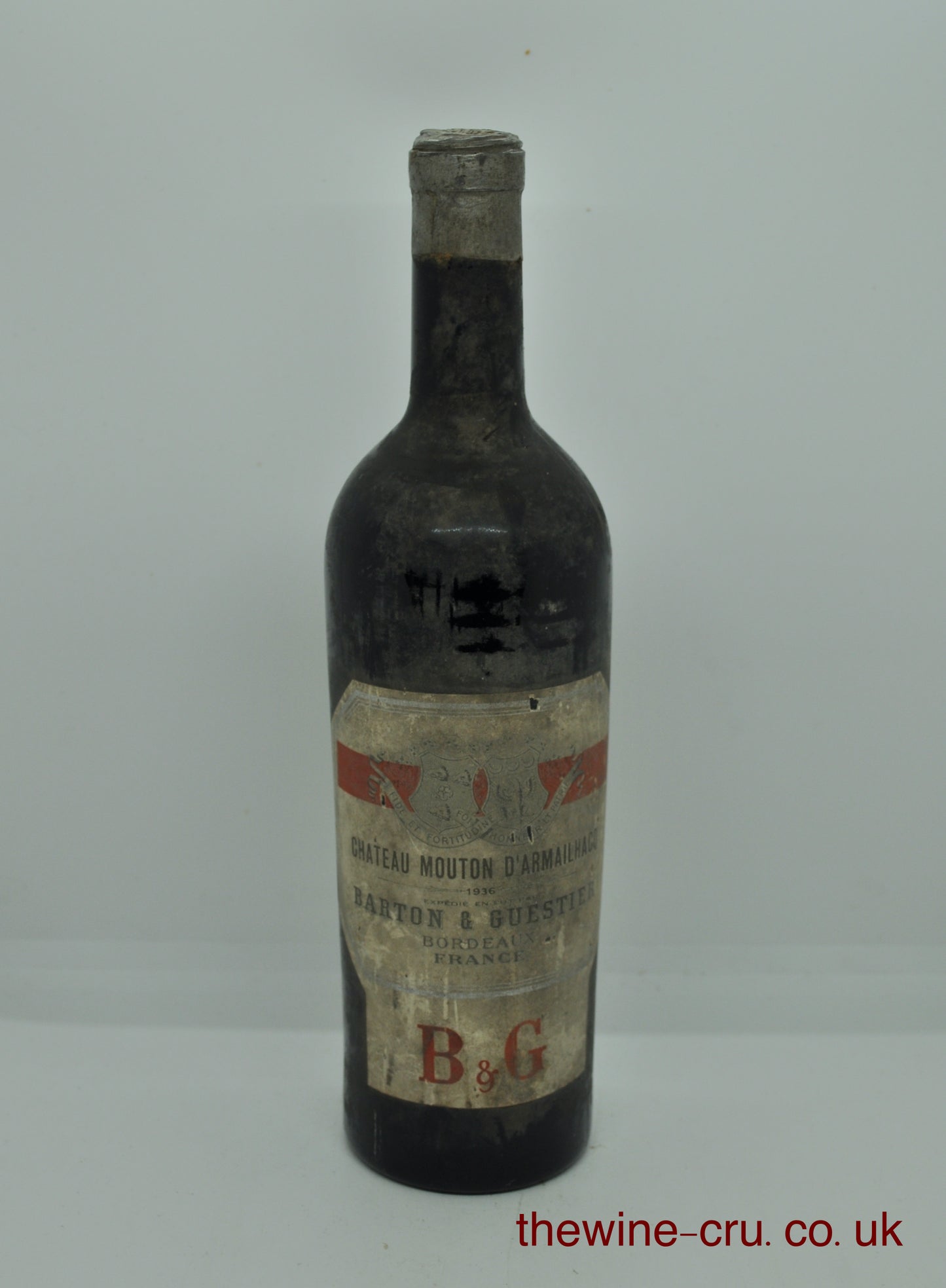 1936 vintage red wine. The bottle is dirt and the wine level is mid shoulder. Immediate delivery. Free local delivery. Gift wrapping available.