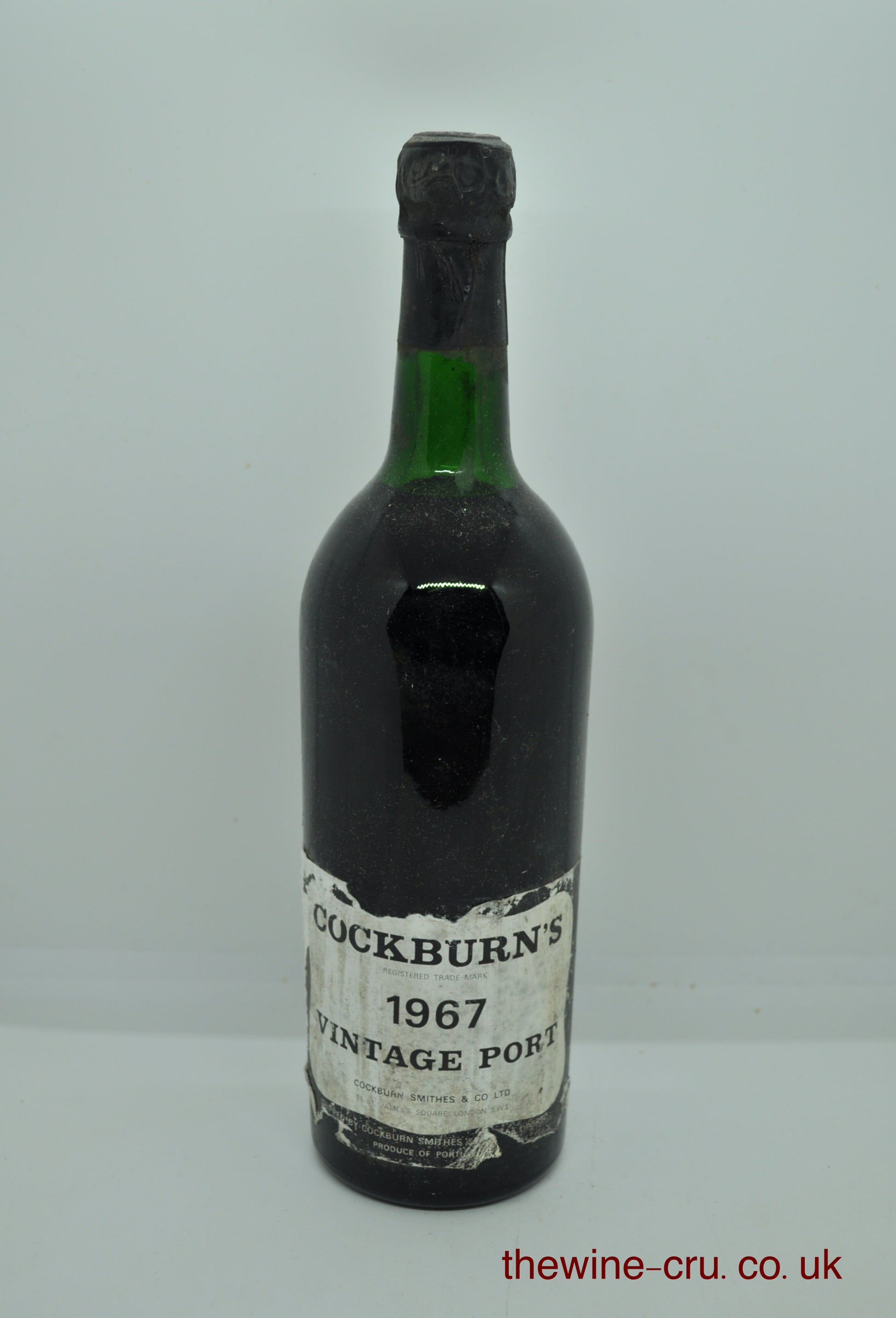 1967 vintage port wine. The bottle is in good condition for its age. The label is a little bin soiled and the wine level is top shoulder. Immediate delivery. Free local delivery. Gift wrapping available.