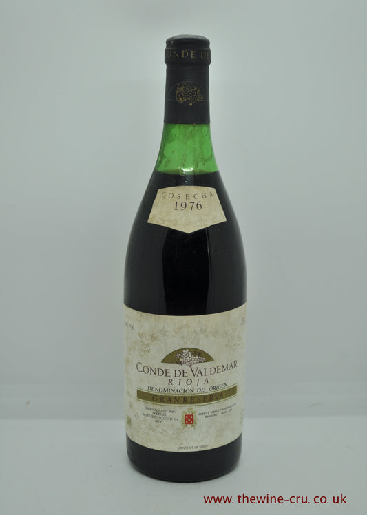 1976 vintage red wine. Conde De Valdemar Rioja Gran Reserva Spain 1976. The bottle is a little bin soiled and the wine level is 3cm below base of the cork. Immediate delivery. Free local delivery. Gift wrapping available.