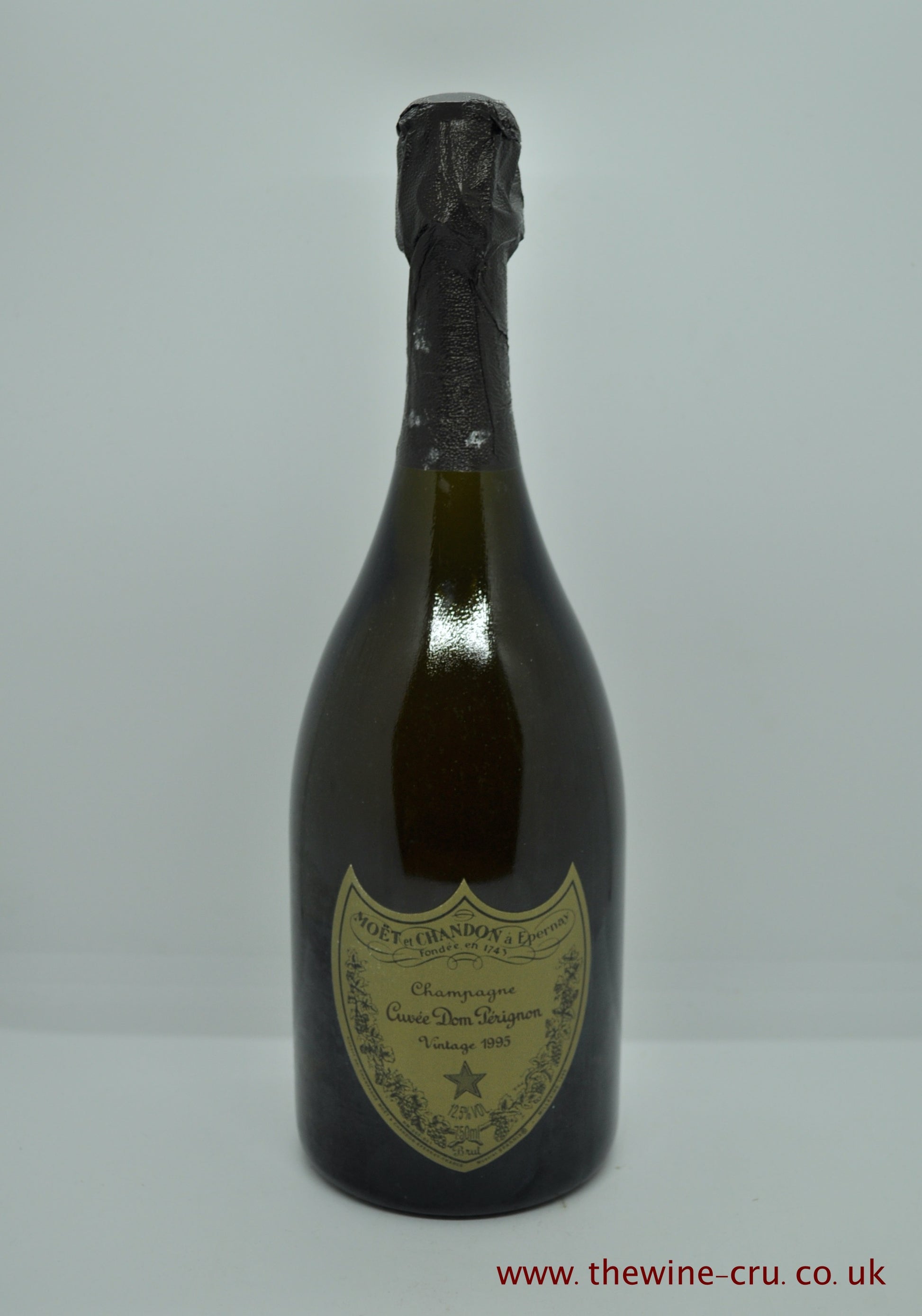 1995 vintage Champagne.Still with aboriginal presentation box. The level of the wine is just below the foil.The box is a little bashes and marked in places. Immediate delivery. Free local delivery. Gift wrapping available