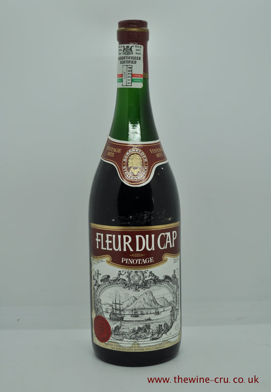 1975 vintage red wine. Fleur du Cap Pinotage 1975. The bottle is in good condition generally. The wine level is just behind the neck label. The equivalent of mid shoulder. Immediate delivery. Free local delivery. Gift wrapping available. 