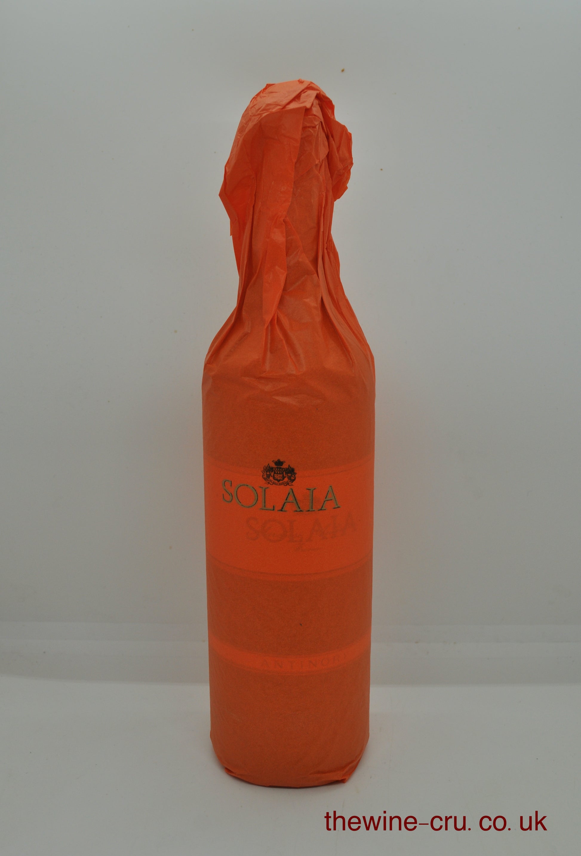 2010 vintage red wine from Tuscany. The bottle is in excellent condition and still in its original orange tissue wrap. Immediate delivery. Free local delivery. Gift wrapping available.