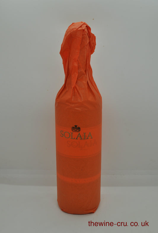 2010 vintage red wine from Tuscany. The bottle is in excellent condition and still in its original orange tissue wrap. Immediate delivery. Free local delivery. Gift wrapping available.