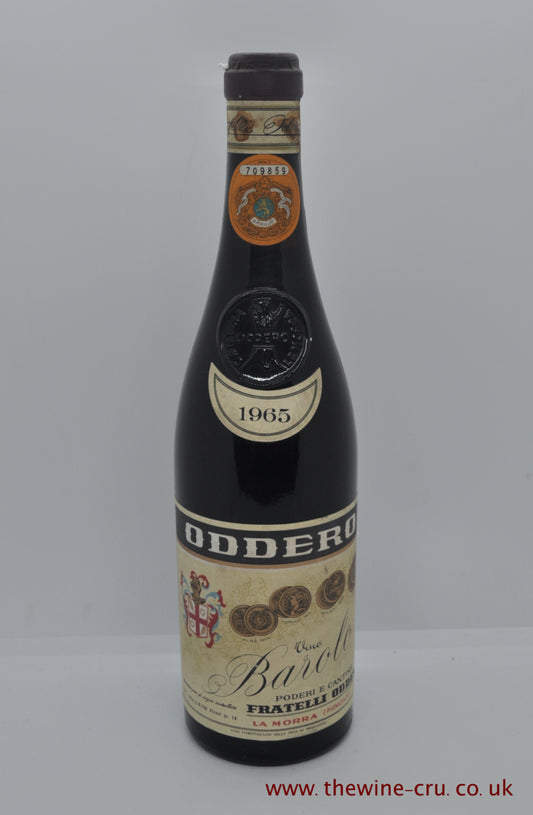 1965 red wine from Barolo, Italy. The bottle is in good condition with the wine level above the emblem. Immediate delivery. Free local deliver. Gift wrapping available.