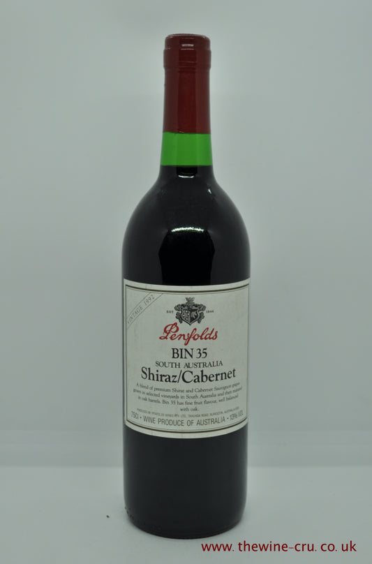 1992 vintage red wine. Penfolds in 35 Shiraz Cabernet. Australia. The bottle is in good condition. The wine level is base of neck.