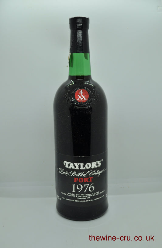 1976 vintage port wine in a magnum bottle. The bottle is in good condition with the wine level being base of neck. Immediate delivery. Free local delivery. Gift wrapping available.