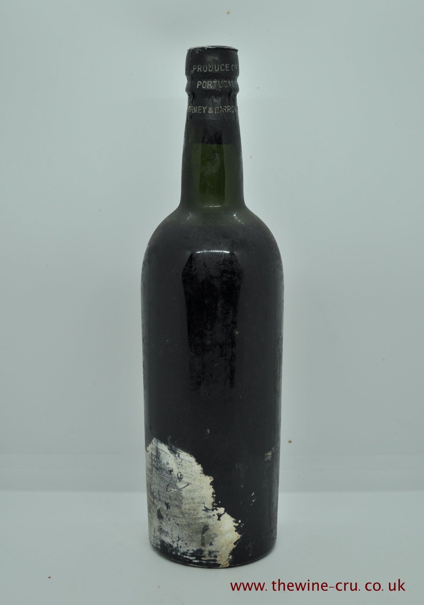 1947 vintage port wine. The bottle is label-less, but the vintage and name are visible on the capsule. The wine level is top shoulder. Immediate delivery. Free local delivery. Gift wrapping available.
