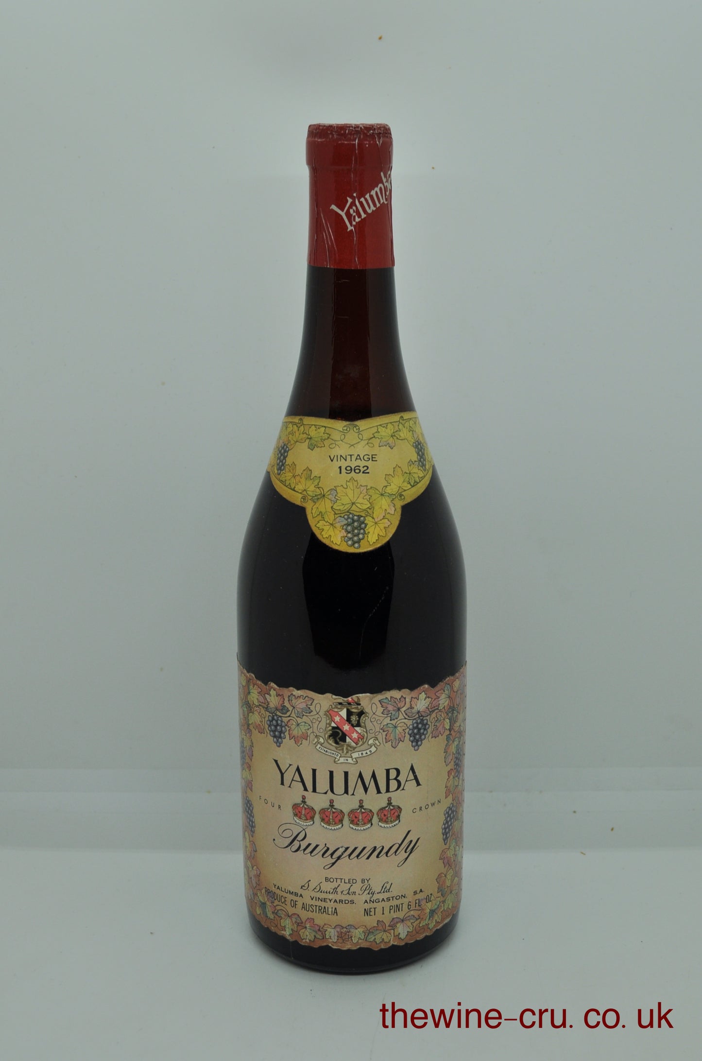 1962 vintage red wine in an imperial pint bottle. The bottle is in good condition with the wine level being 3cm below the base of the cork. Immediate delivery. Free local delivery. Gift wrapping available.